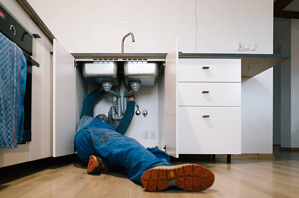 Professional Drain Cleaning technician working in Brighton, CO